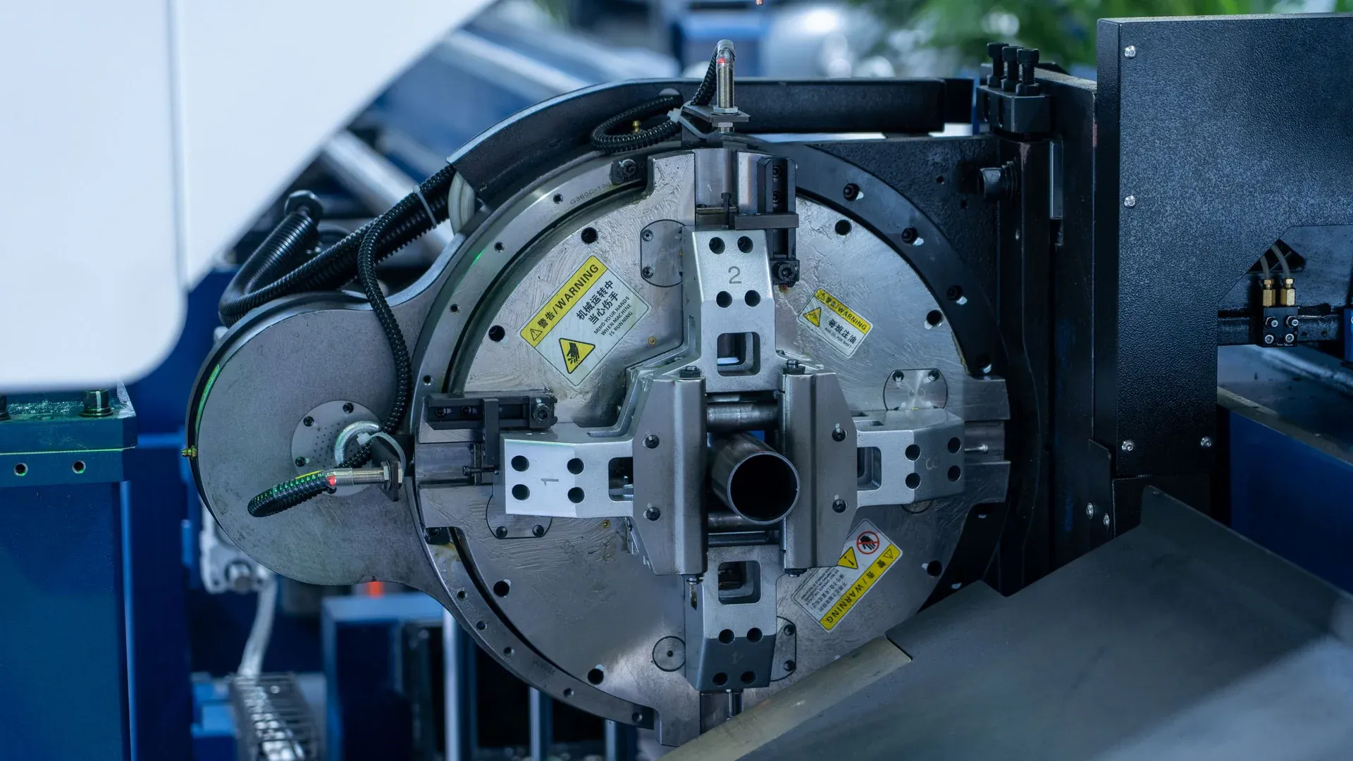 Close-up of a high-precision CNC machine in an industrial setting demonstrating advanced technology
