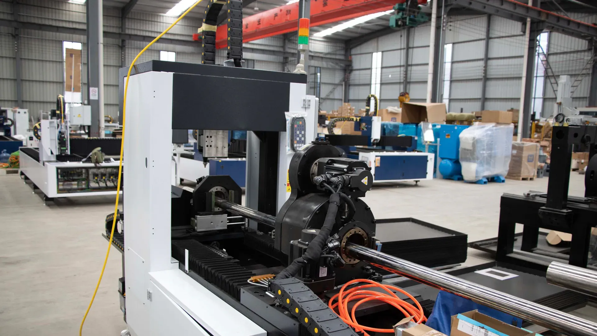 EV busbar manufacturing equipment inside an industrial workshop