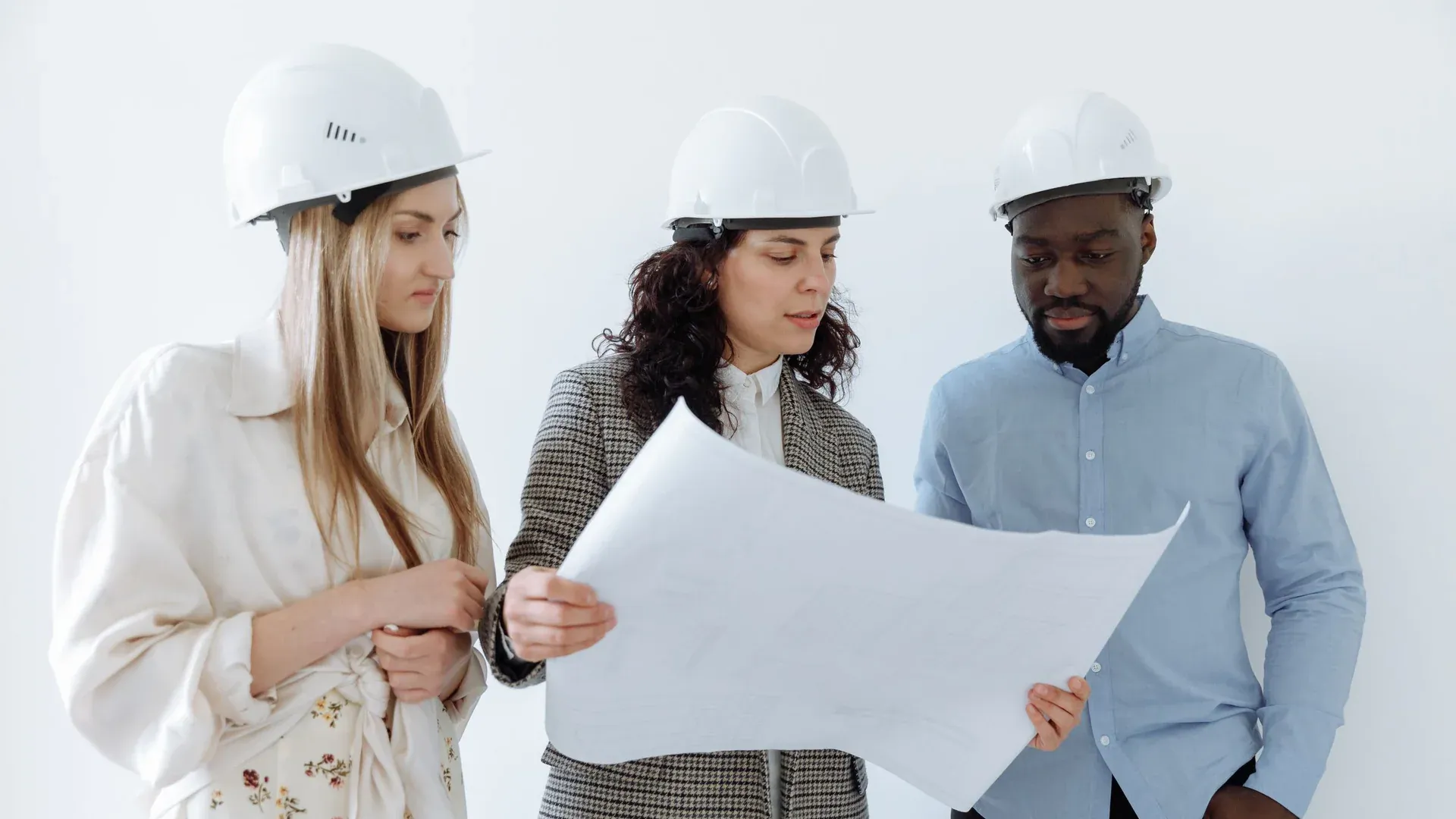 Engineering and procurement team reviewing drawings for an equipment purchase