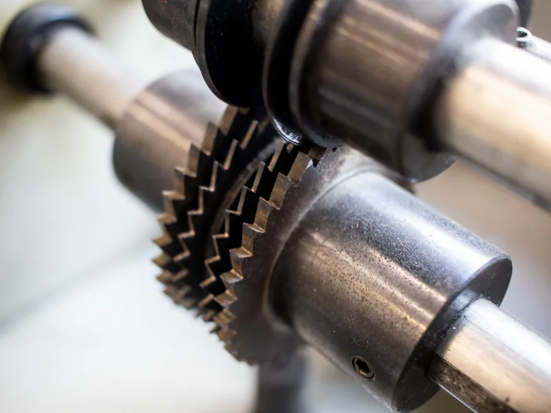 Detailed view of interlocking metal gears in industrial machinery