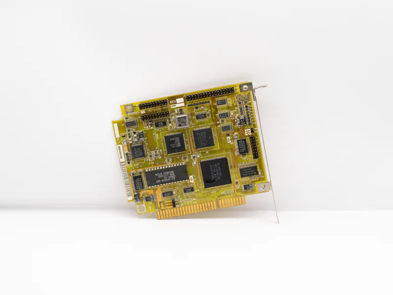 Antique circuit board showcasing vintage computing technology, isolated on a white background