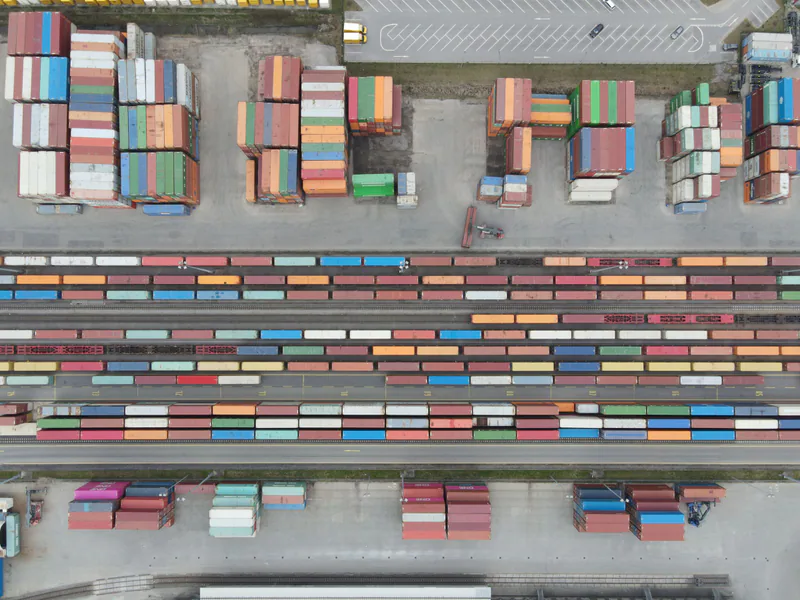 Aerial shot of stacked cargo containers at Regensburg port showcasing freight transport activity