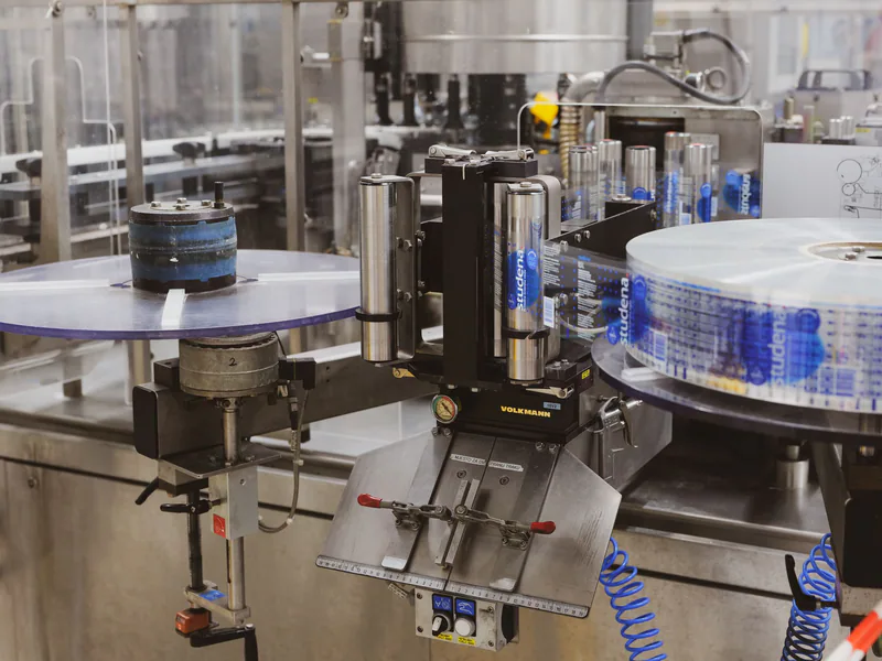 Close-up of automated machinery in a Lipik factory’s production line