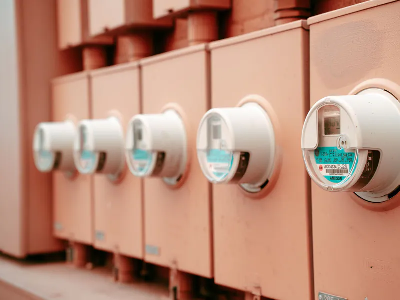 Power meters mounted on an electrical distribution panel