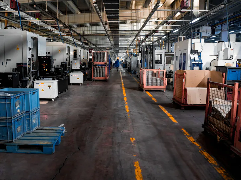 Production aisles inside an automotive component factory