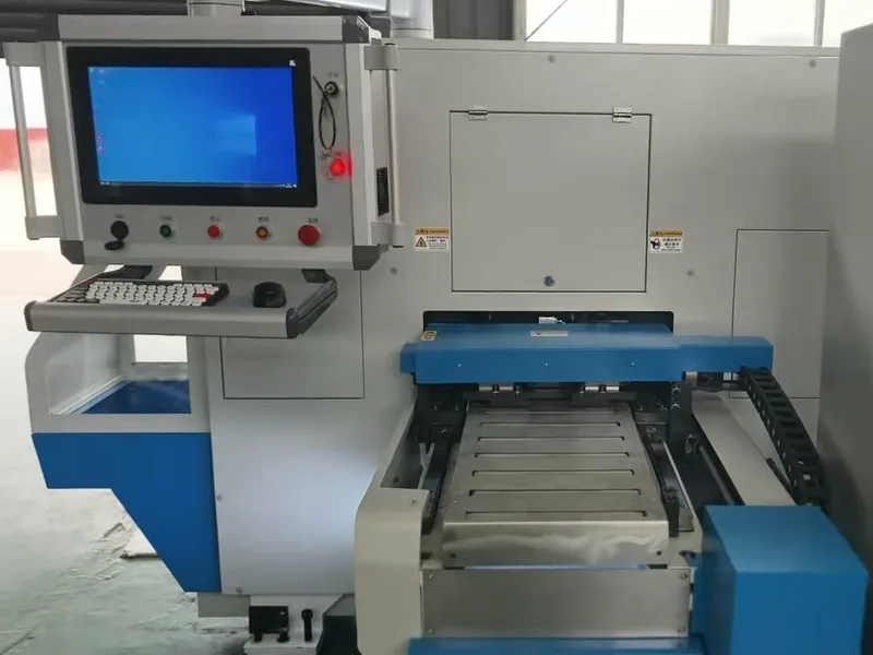 CNC busbar machine and work table inside a production workshop