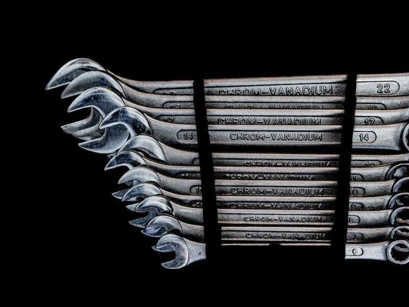 Set of combination wrenches organized for machine maintenance