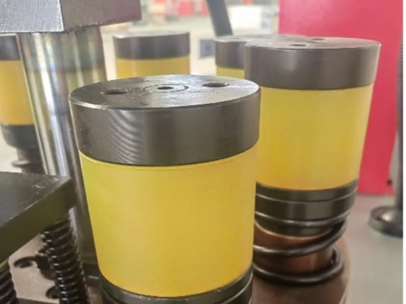 Busbar punching unit with guarded tooling and material support
