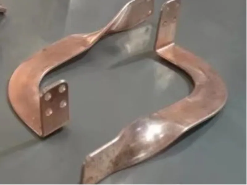 Finished copper parts awaiting serialized production identification