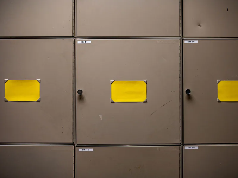 Labeled industrial cabinets used to organize controlled production tools