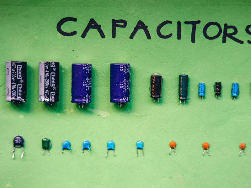 Electrical capacitors and control components organized as replacement parts