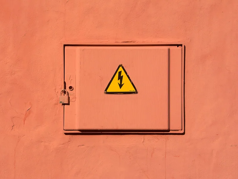 Locked high-voltage enclosure used to discuss energy-control boundaries