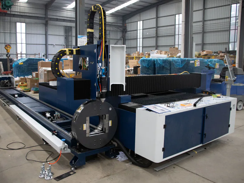Large CNC machine under assembly on a factory production floor