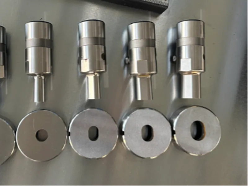 Busbar punching dies arranged for a tool-change review